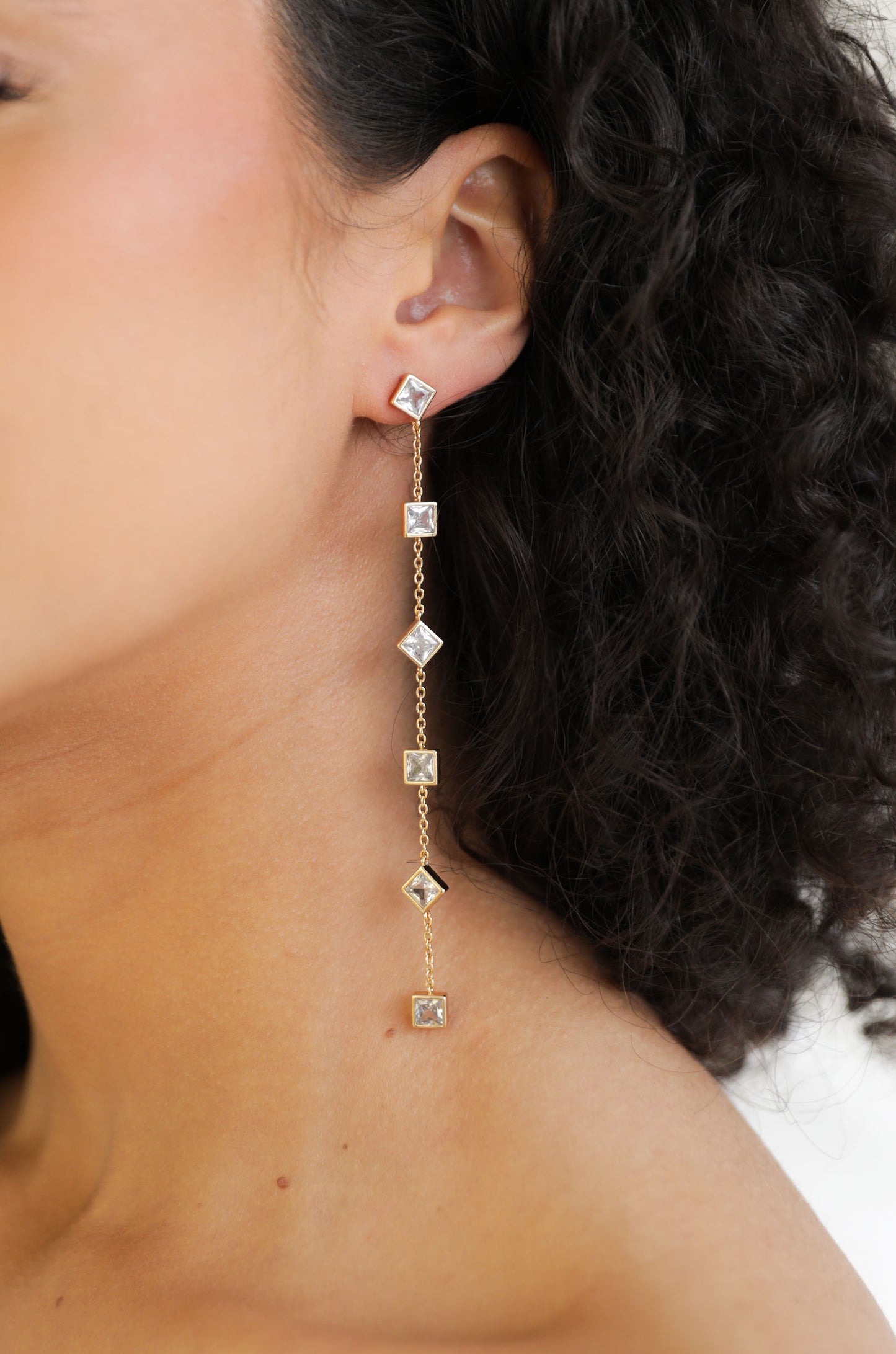 Geometric Linear 18k Gold Plated Earrings in clear on model